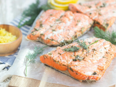 salmon on cutting board with dill