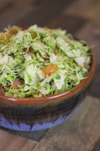 shaved brussels sprouts salad in bowl