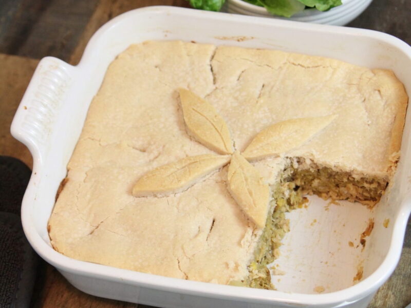 salmon tourtiere in white square dish