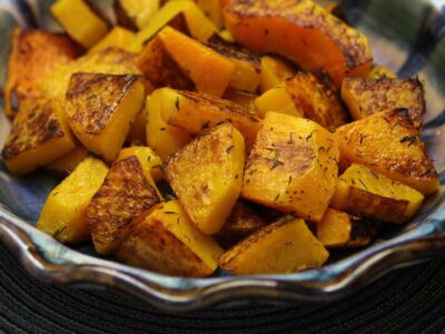 Roasted Butternut squash nicely caramelized in a serving dish