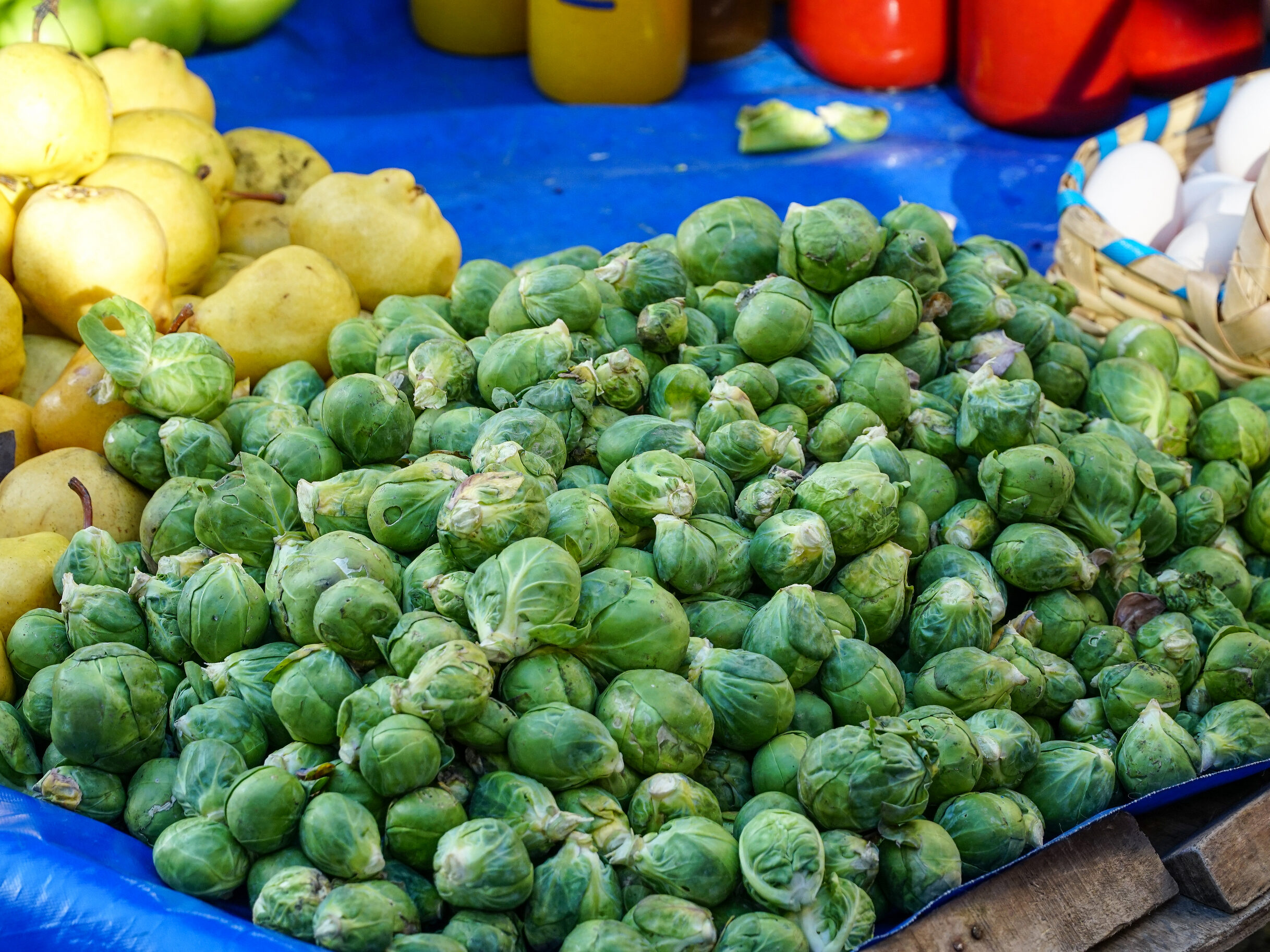 An image of Brussels sprouts at a farmer's market.