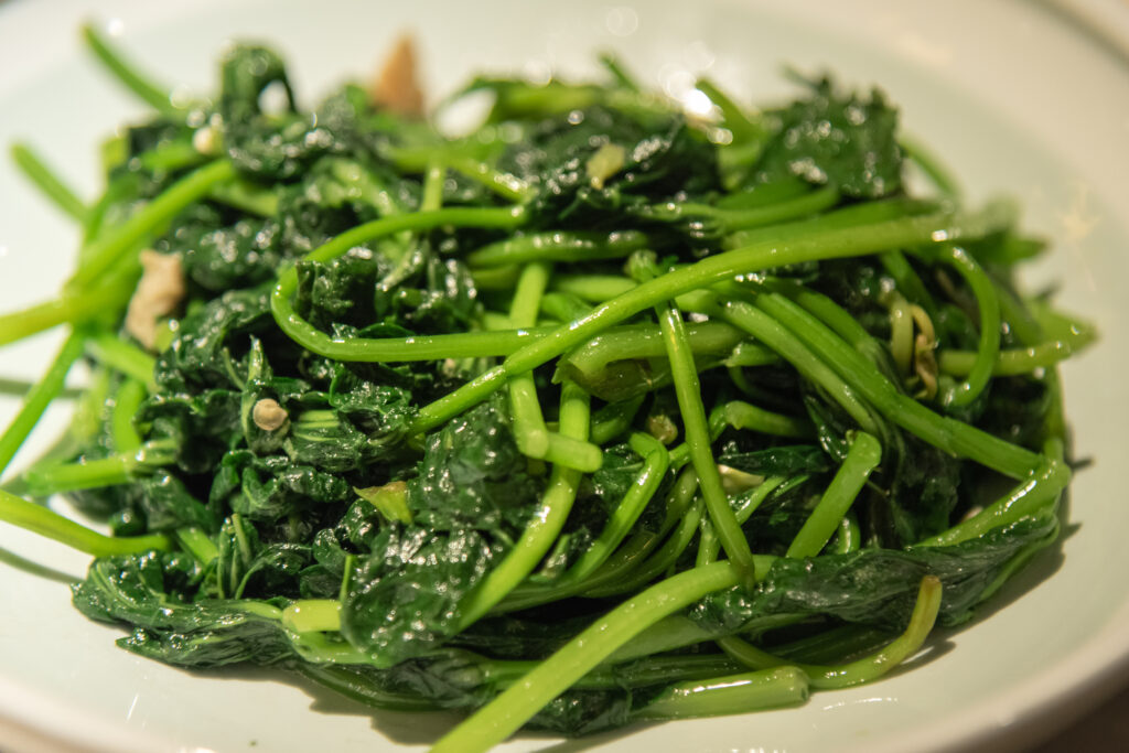 An image of stir-fried sweet potato leaves.