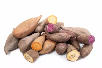 An image of different varieties of sweet potatoes.