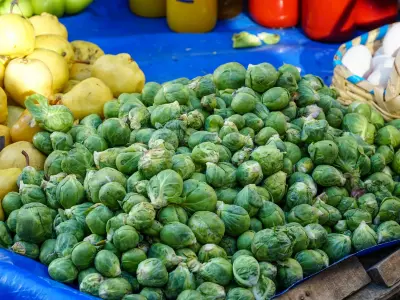 An image of Brussels sprouts at a farmer's market.